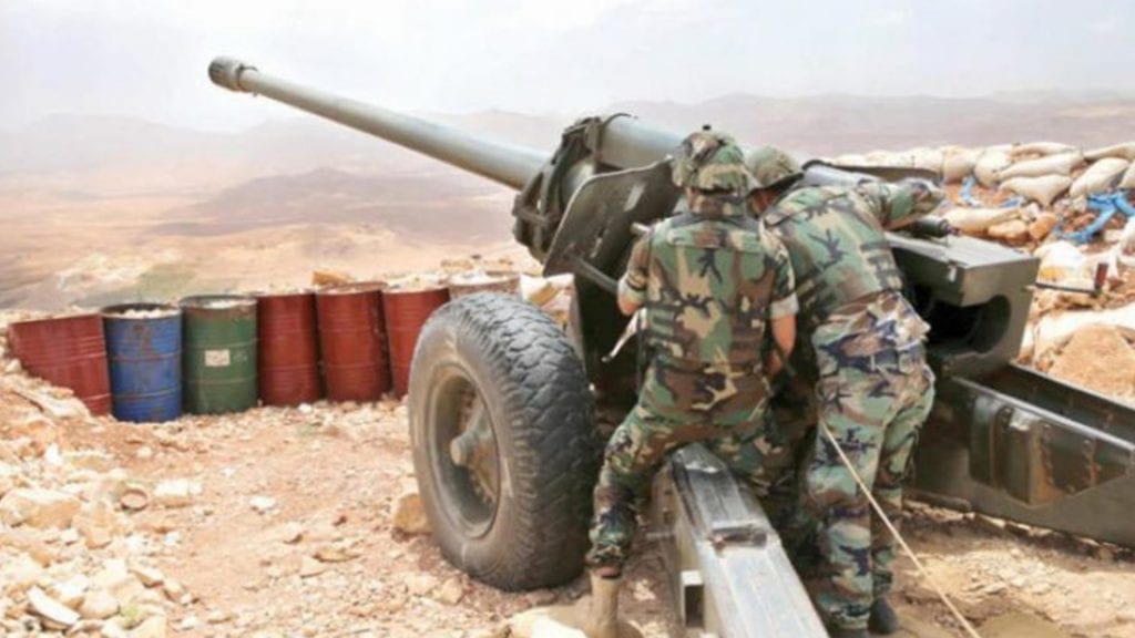 Syrian government forces renewed their artillery shelling on the countryside of Idlib and Hama
